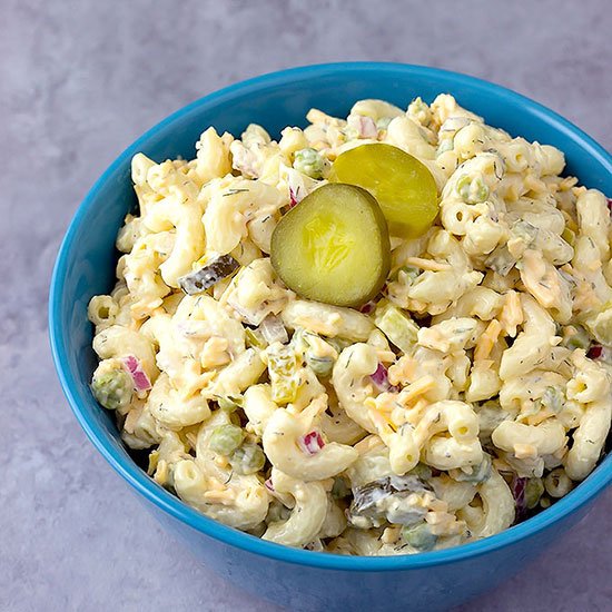 blue bowl full of Dill Pickle Pasta Salad