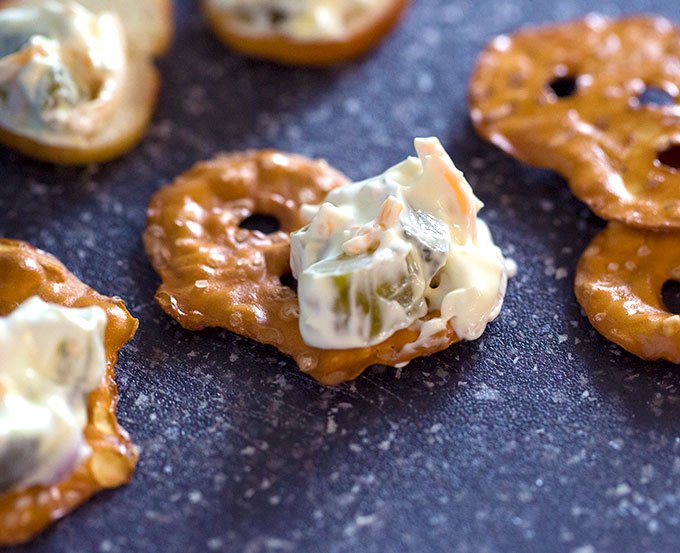 pretzel chip covered in dill pickle dip