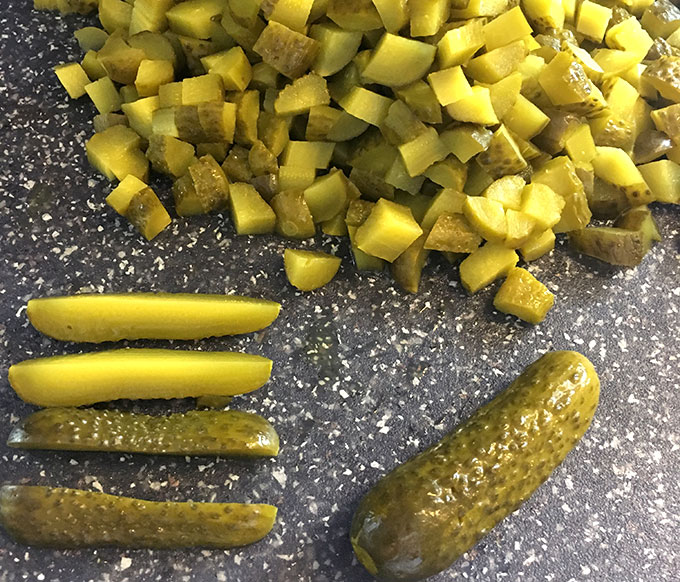 Chopped dill pickles for pickle appetizer dip