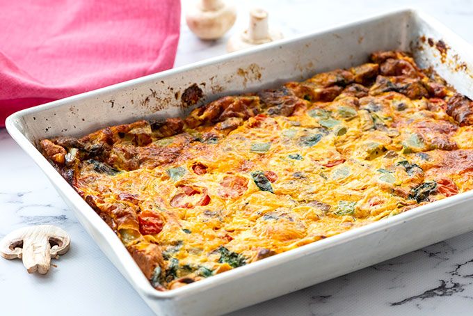 baking dish of loaded vegetable breakfast casserole