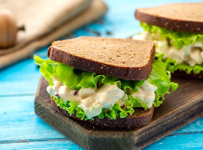 The best chicken salad recipe on sliced bread with lettuce