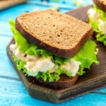 Chicken salad sandwich with lettuce on wheat bread