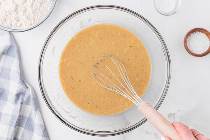 Bowl of wet pancake ingredients.