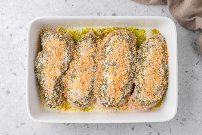 Sprinkled breadcrumbs over the parmesan and pesto.